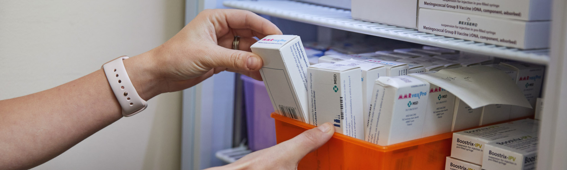 A photo showing a fridge containing vaccines